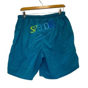 Vintage Speedo Blue Multi-Color Spell-out Logo on Back of Swim Trunks